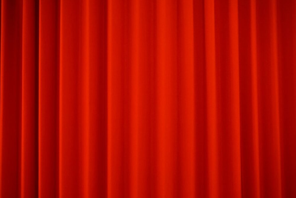 Telón rojo de teatro para eventos y cultura